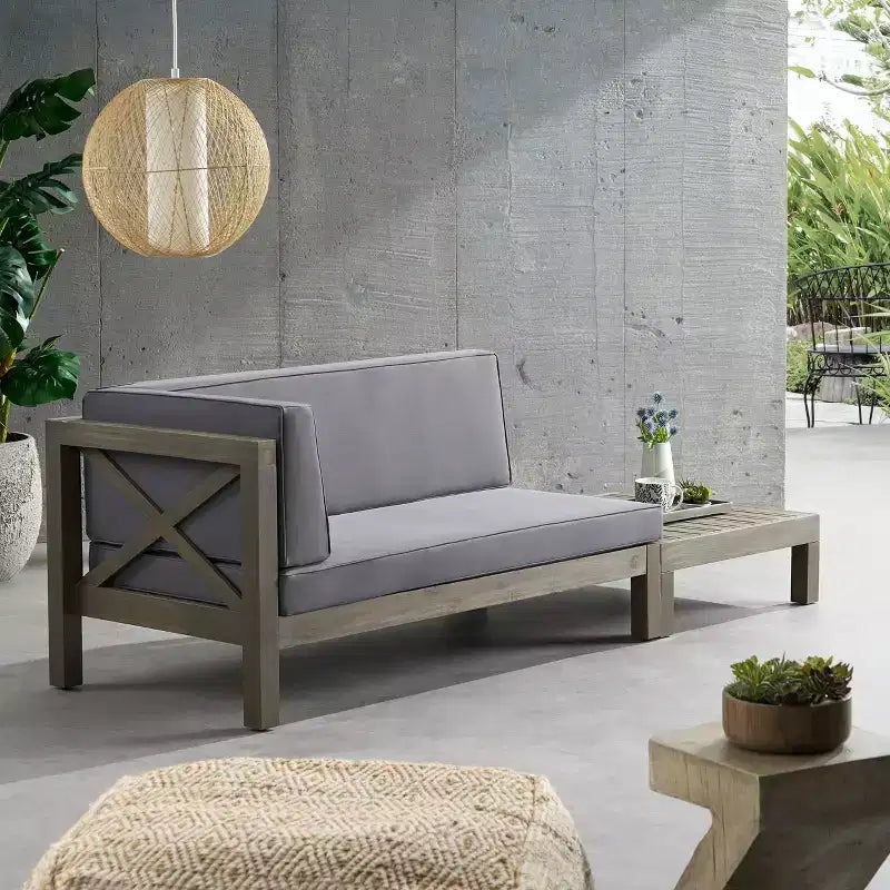 Causeuse d'extérieur 2 pièces Brava en bois d'acacia avec accoudoir gauche et table basse avec coussin gris/gris foncé - Christopher Knight Home