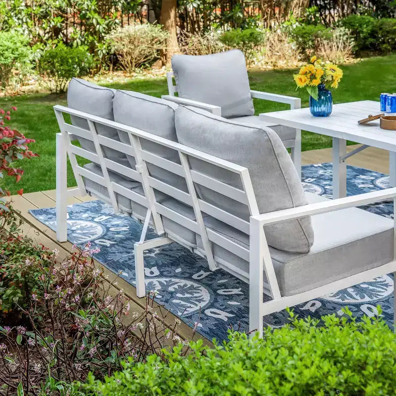 Ensemble de 6 pièces Captiva Designs, Foyer d'extérieur moderne en aluminium avec fauteuils et poufs