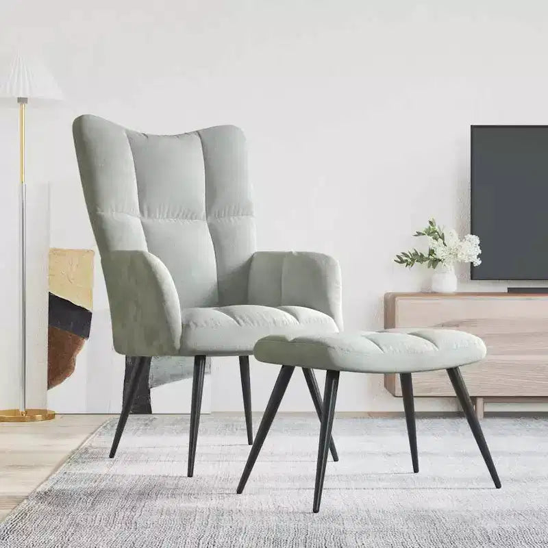 Fauteuil de relaxation en velours gris clair avec repose-pieds