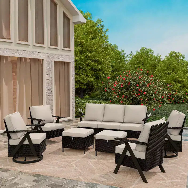 Ensemble de sept meubles d'extérieur UPTIOT : canapé 3 places, 2 fauteuils à bascule pivotants, 2 fauteuils individuels et 2 poufs pour un confort optimal sur votre terrasse