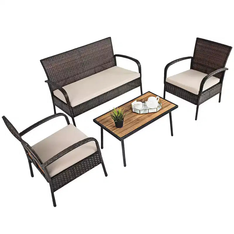 Ensemble de mobilier de patio Costway 4 pièces en rotin, ensemble de conversation extérieur avec table basse et coussins