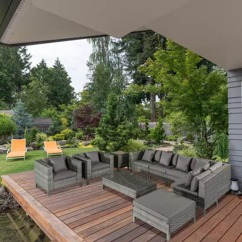 Outsunny Ensemble de mobilier de patio sectionnel d'extérieur en rotin et osier 9 pièces avec design moderne, coussins épais et doux, repose-pieds et table basse