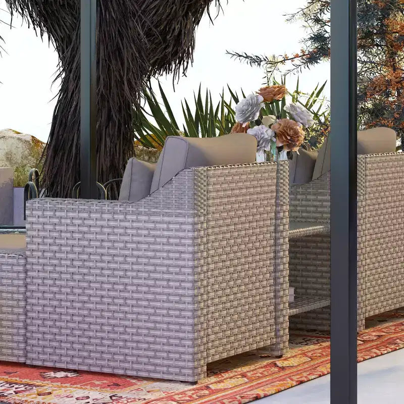 Ensemble de meubles de patio Outsunny 5 pièces, ensemble de fauteuils et poufs de conversation en rotin PE résistant aux intempéries avec table, coussins et oreillers inclus